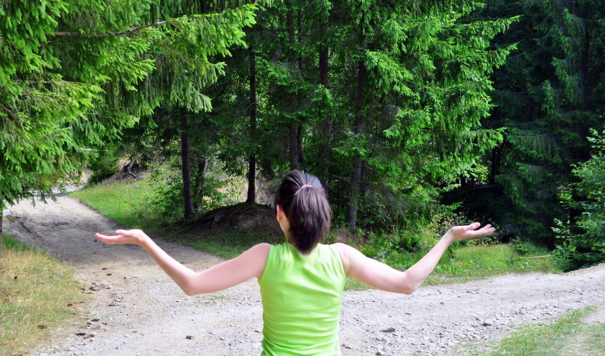 Girl with a choice near the forked road
