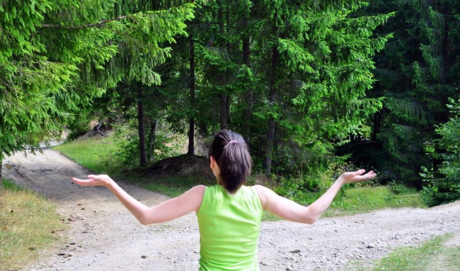 Girl with a choice near the forked road